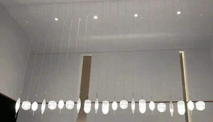 Floating Lantern Pod Pendant Chandelier – A Linear Statement for Reception & Display Counters
